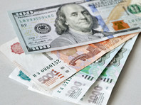 Рубль подешевел по отношению к доллару и евро во второй день Рождества